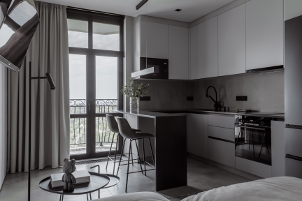 Contemporary grey apartment with concrete-effect porcelain stoneware